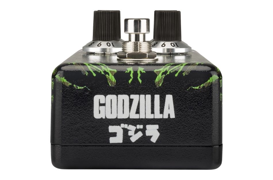 Die Rückseite trägt das markante Godzilla-Logo der limitierten Fender-Kooperation und rundet das aufwendig gestaltete Gehäuse optisch ab.